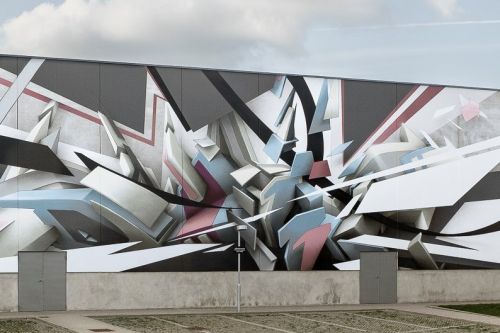 Mirko Reisser (DAIM) | ''DAIM - coming out Næstved'' | Spraypaint and facade paint on concrete wall | 760 x 4100 cm / 299.21 x 1614.17 inch (Hight incl socket: 9 m.) | Næstved / Denmark | 2018 | © Mirko Reisser (DAIM) | Courtesy: NÆSTVED KUNSTBY | Photo: MRpro